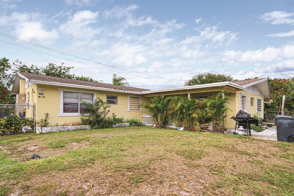 Photo of 3208 Prince Drive, Lake Worth, FL 33461 (MLS # R11087922)