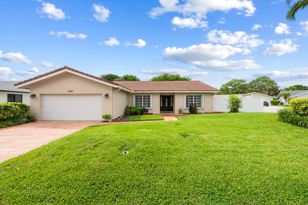 Photo of 6760 HOLLANDAIRE Drive W, Boca Raton, FL 33433 (MLS # B26079980)