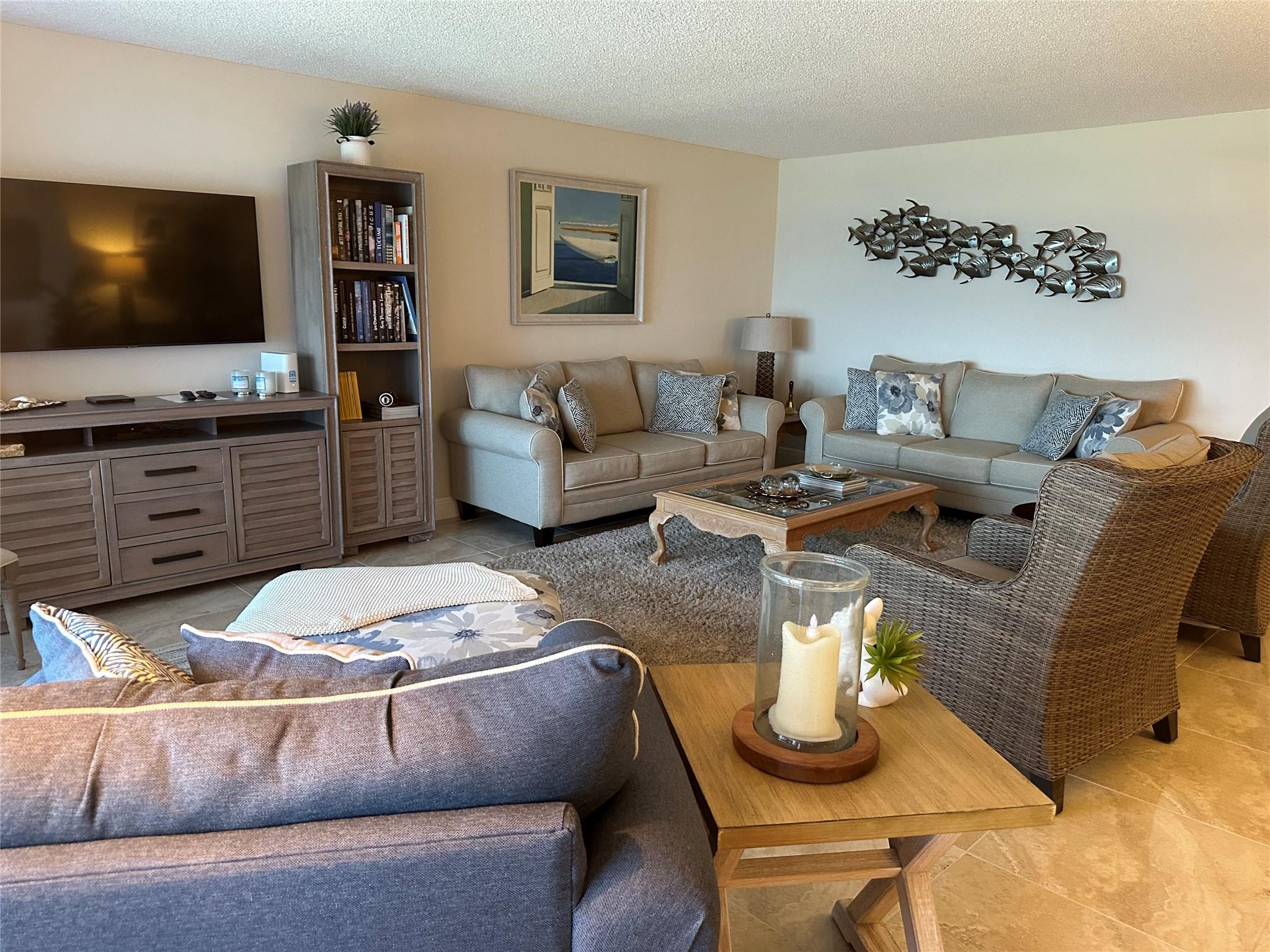 GREAT SEASONAL RENTAL WITH BEAUTIFUL DIRECT VIEW OF THE OCEAN. ALL REMODELED, 2 BEDROOMS, 2 AND 1/2 BATHROOMS AND A BONUS ROOM. IMPACT WINDOWS, NEW KITCHEN AND BATHROOMS CABINETS, RESORT LIKE LIVING AT SEA RANCH A! SEA RANCH OFFERS 3 POOLS, 8 TENNIS COURTS, BEACH CABANAS WITH OPEN AIR KITCHENS ,BBQs UNDER THE PALMS, GYM, HERB GARDENS, ON A GREAT BEACHFRONT LOCATION. COVERED GARAGE PARKING, ATTENDED LOBBY, ACCROS THE STREET FROM SHOPPING AND DINING. CONCRETE RESTORATION ON THIS UNIT WILL BE FINISHED BY OCT 31 2025