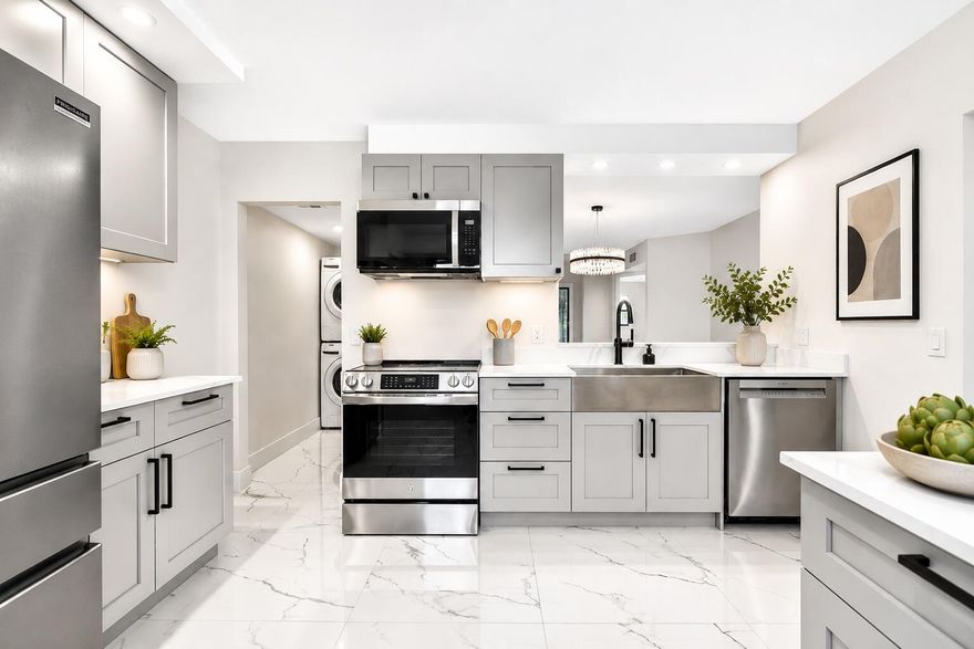 Completely reimagined from top to bottom, this penthouse corner residence offers the rare combination of luxury design, privacy, and peaceful lakefront living. Located in a boutique 4-story building, this light-filled home features additional corner-unit windows, no rear neighbors, and sweeping views overlooking the lake. Every inch has been thoughtfully renovated with oversized imported porcelain flooring, custom cabinetry, designer lighting, recessed LEDs, new plumbing, new electrical, upgraded AC, smart-home features, and premium finishes throughout. The chef-inspired kitchen showcases Calacatta quartz countertops, farmhouse sink, soft-close cabinetry, induction cooking, and professional-series appliances includingincluding Bosch, GE Profile, and Frigidaire Professional. The oversized primary suite offers a flex sitting area, dual walk-in closets, spa-inspired bath with soaking tub, rain shower, imported Italian tile, and custom double vanity. Additional highlights include a built-in bar with dual wine refrigerators, in-unit laundry room, hurricane shutters, premium parking, strong reserves, and no assessments. HOA includes cable, water, and insurance.
