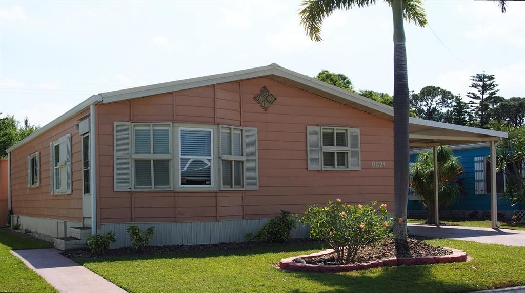 Photo of 8621 Florence Drive, Port Saint Lucie, FL 34952 (MLS # R10702951)