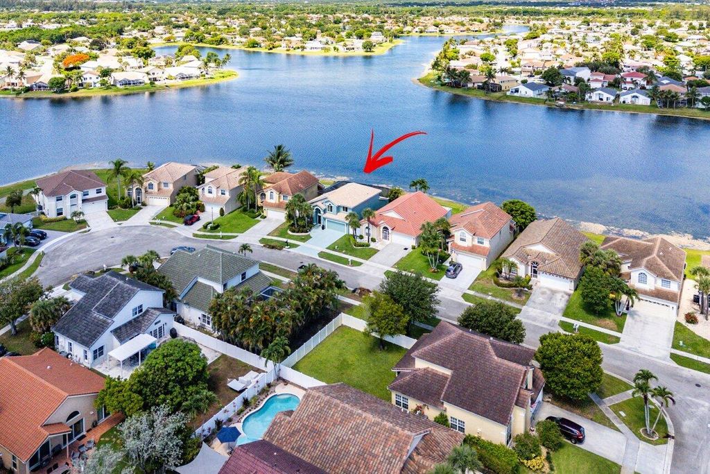 Photo of 7141 Charleston Point Drive, Lake Worth, FL 33467 (MLS # R11100815)