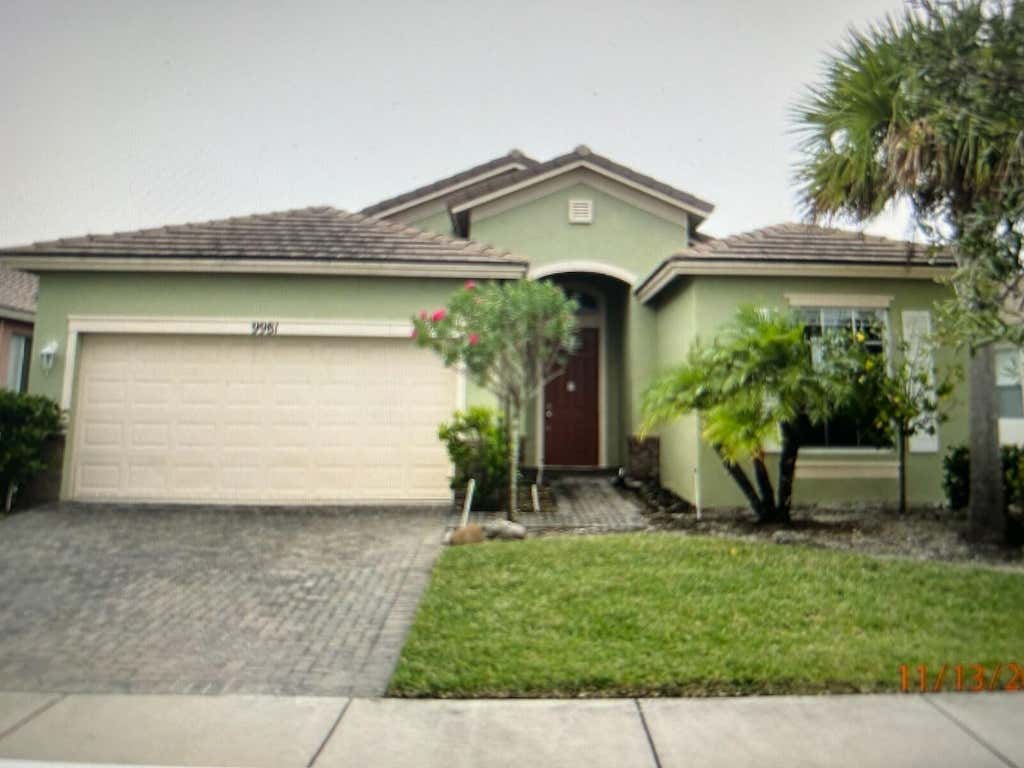 Photo of 9981 SW Glenbrook Drive, Port Saint Lucie, FL 34987 (MLS # B26044188)