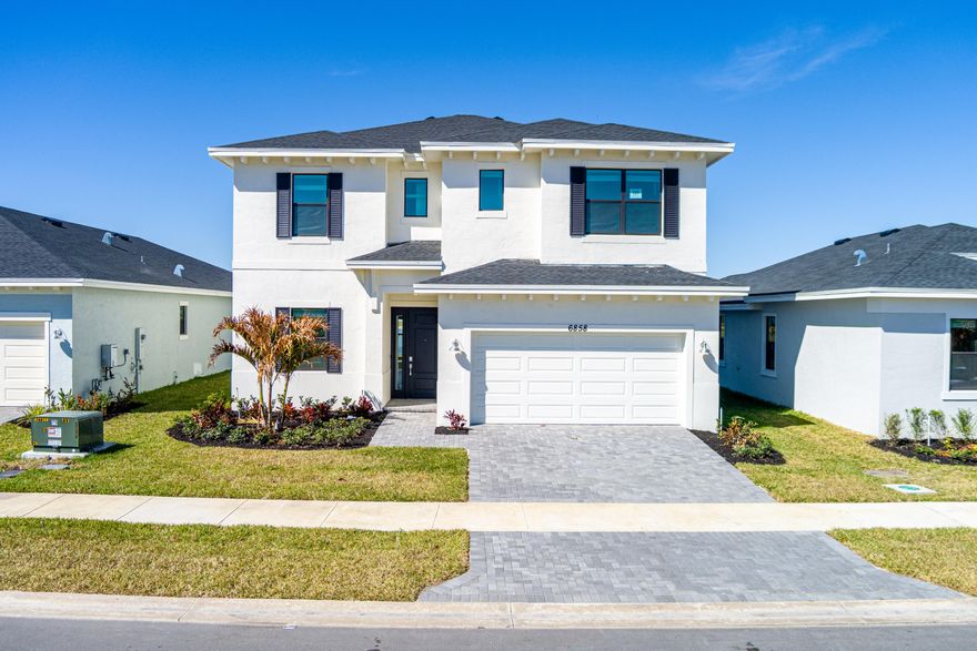 The first floor of this new two-story home is an open-concept floorplan with access to a covered lanai and a study is easily accessible off the foyer. Upstairs, four bedrooms surround a versatile loft, including the luxe owner's suite with a spa-inspired bathroom and walk-in closet.

Prices, dimensions and features may vary and are subject to change. Photos are for illustrative purposes only.