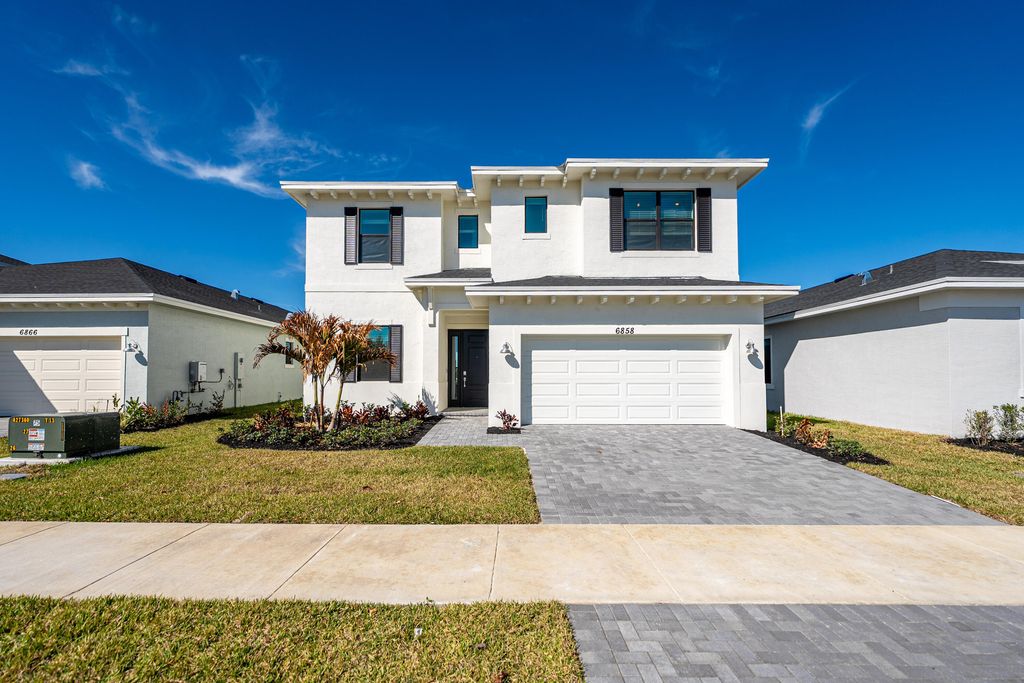 Photo of 6858 NW Kestrel Lane, Port Saint Lucie, FL 34987 (MLS # R11165062)