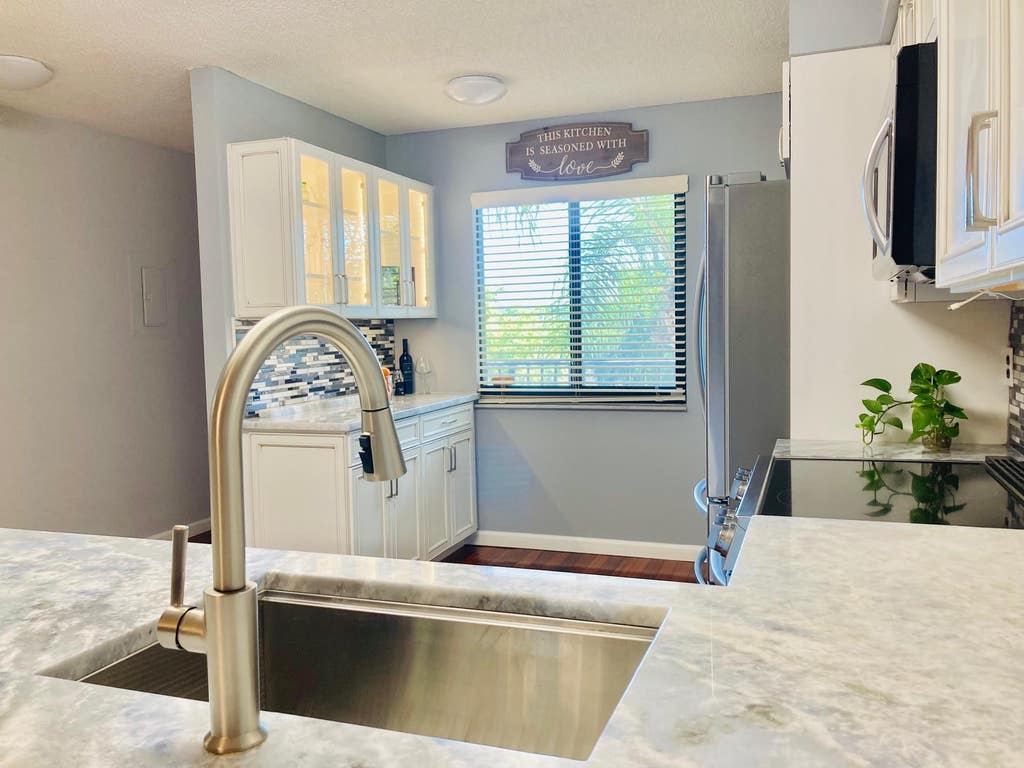 Photo of 2112 S Cypress Bend Drive #306, Pompano Beach, FL 33069 (MLS # F10404813)