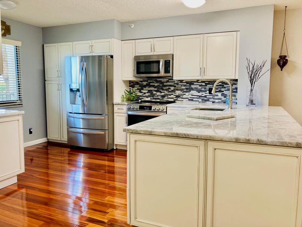 Photo of 2112 S Cypress Bend Drive #306, Pompano Beach, FL 33069 (MLS # F10404813)