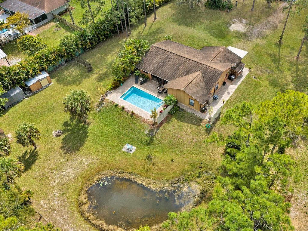 Photo of 11955 N 62nd Lane, West Palm Beach, FL 33412 (MLS # F10424101)