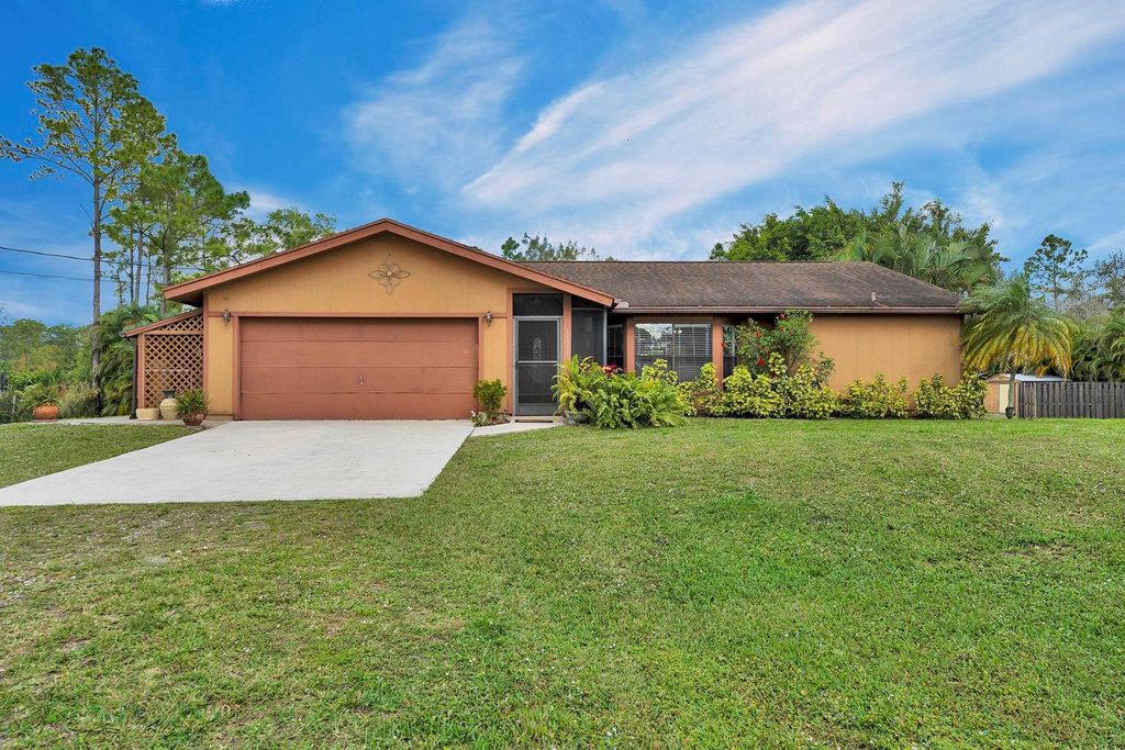 Photo of 11955 N 62nd Lane, West Palm Beach, FL 33412 (MLS # F10424101)