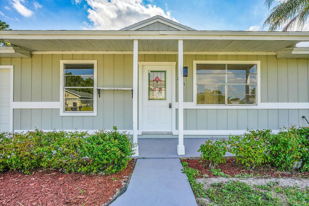 Photo of 2191 SW Barthel Street, Port Saint Lucie, FL 34984 (MLS # R11082528)