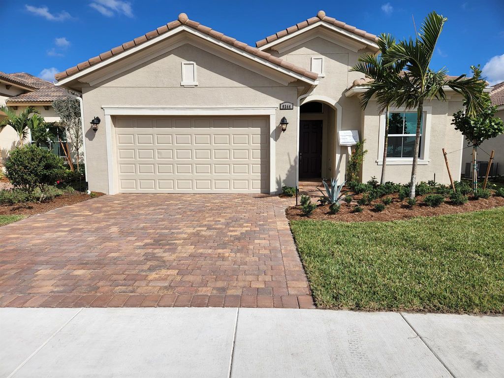 Photo of 9344 SW Pepoli Way, Port St Lucie, FL 34987 (MLS # R10912470)