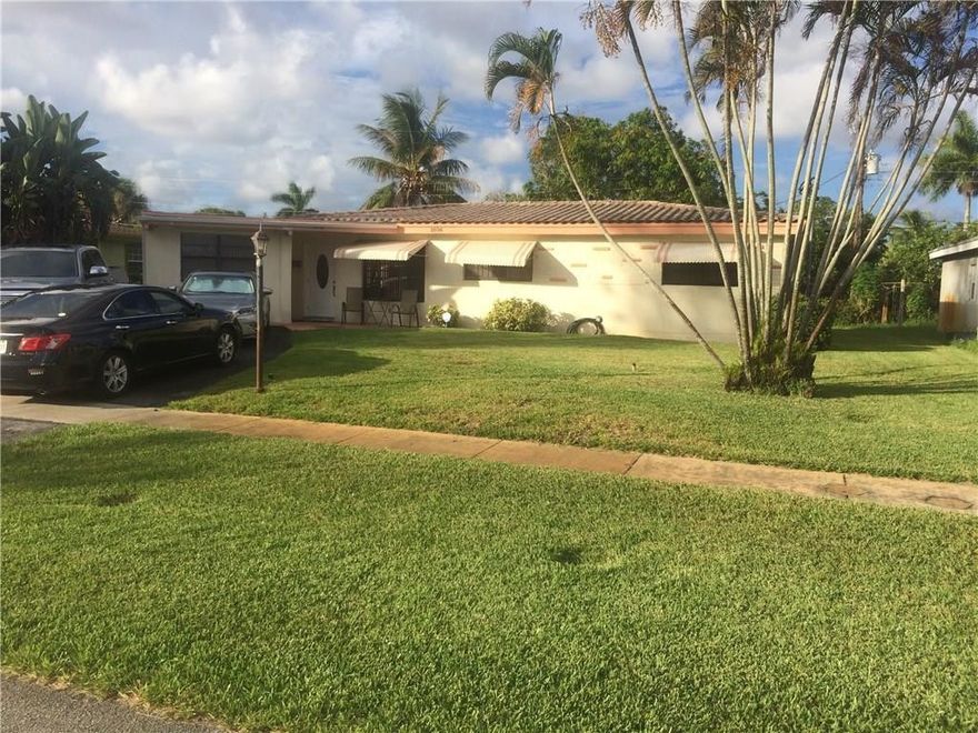 Beautiful home, with many upgrades, new hurricane impact windows, renovated bathrooms, renovated kitchen with new kitchen cabinets, with new stainless steel appliances, outside camera surveillance system, hurricane panels for doors, ceramic tile thru-out, new carpeting in all bedrooms. Laundry room with washer & dryer. Just tented in June 2017, sprinkler system & much more. This one will not last.