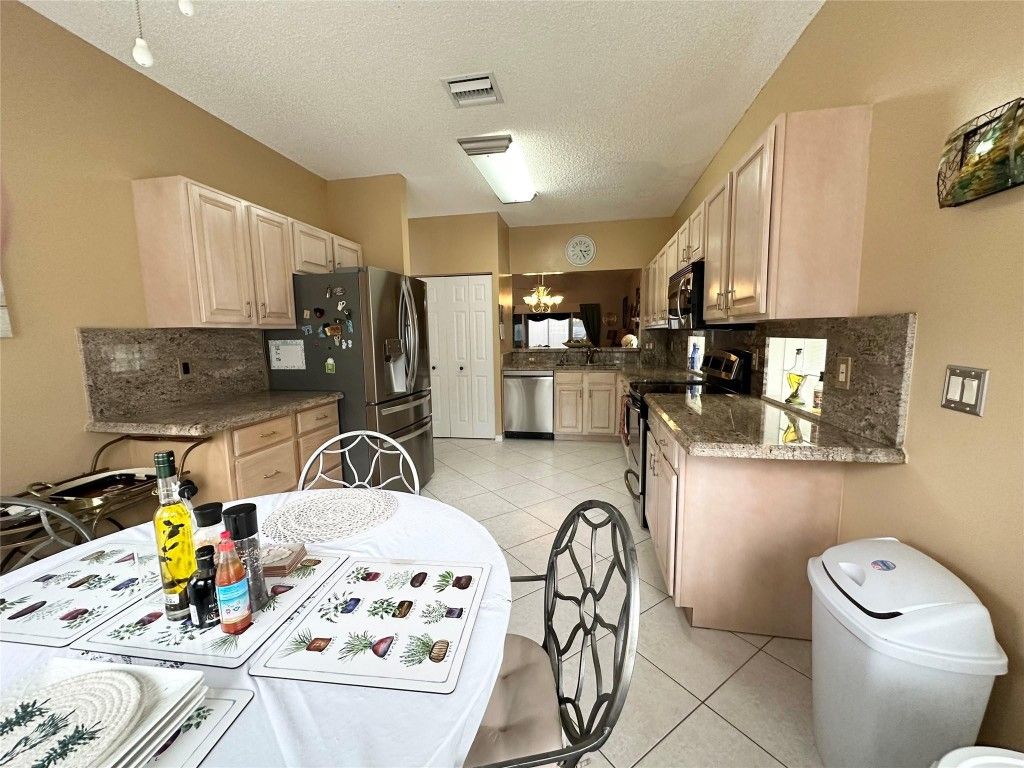 Photo of 6302 Harbour Oak Drive, Lake Worth, FL 33467 (MLS # F10532775)