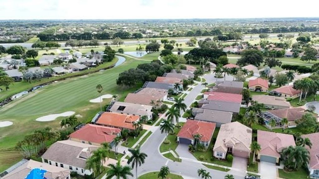 Photo of 6302 Harbour Oak Drive, Lake Worth, FL 33467 (MLS # F10532775)
