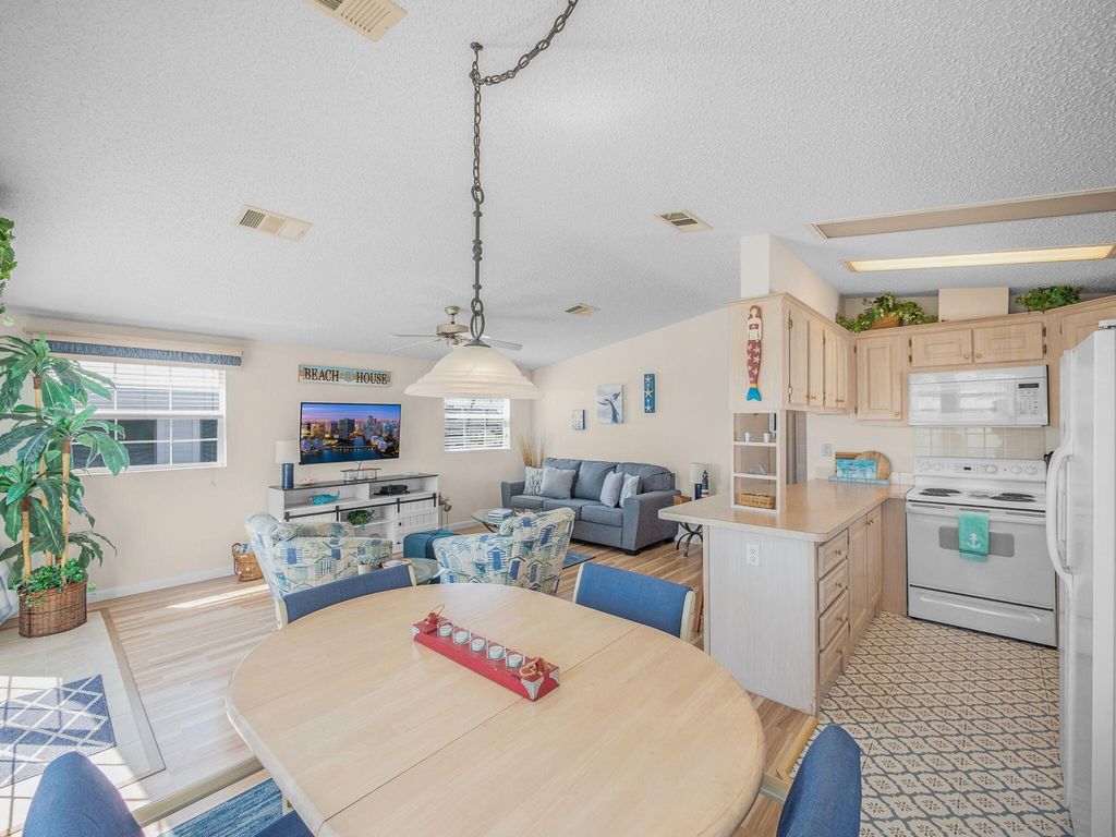 Photo of 802 Nettles Boulevard, Jensen Beach, FL 34957 (MLS # B26008061)