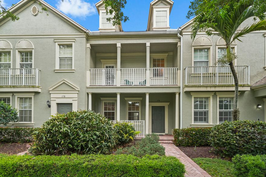 Tree-lined streets and unobstructed lake views from both your front porch and upstairs balcony make this 3 Bedroom, 2.5 bath townhome with a 1 car garage a truly exceptional place to call home. Nestled in the highly sought-after community of Botanica, this hidden gem offers charm and convenience. Enjoy peace of mind with a new roof (2025) and hurricane impact windows upstairs. Exceptionally low HOA ($278.49/month). A private alley in the back provides direct garage access. Conveniently walk to Sea Plum Town Center, home to Publix, Starbucks, and a variety of shops and restaurants, or bike to the beach and nearby waterfront dining, entertainment, Jupiter Medical Center, the post office, and highly rated schools. A rare opportunity to own one of the only units currently available - don't  miss it.