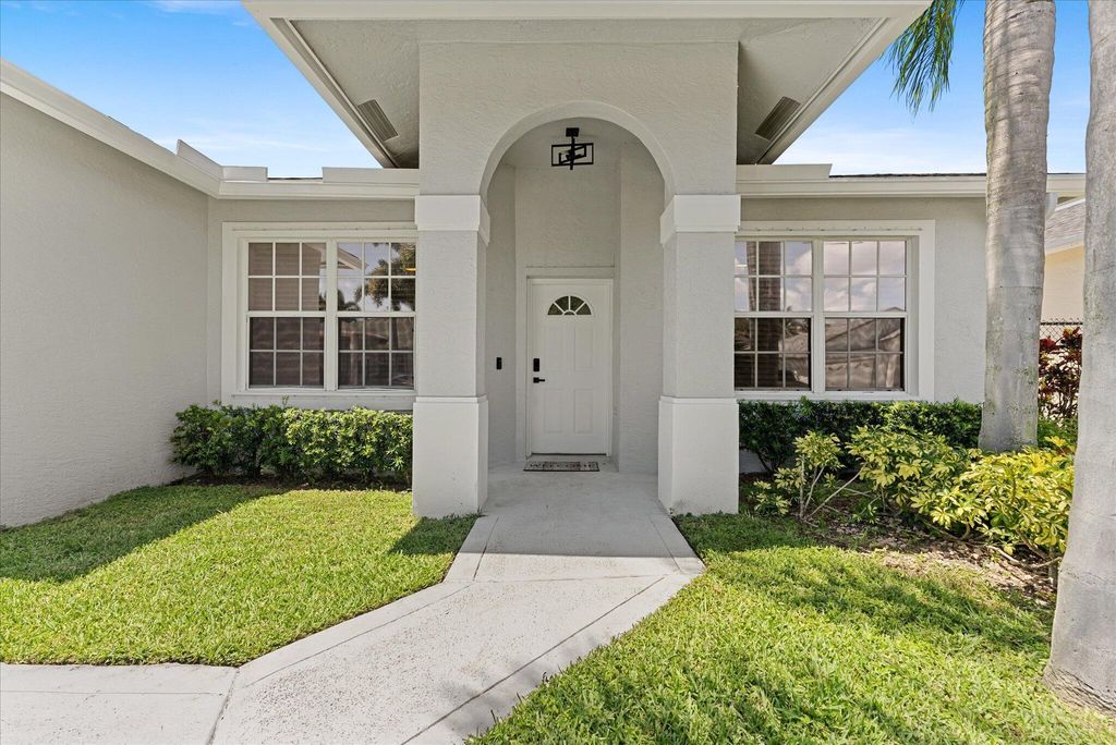 Photo of 1209 Olympic Circle, Greenacres, FL 33413 (MLS # R11100595)