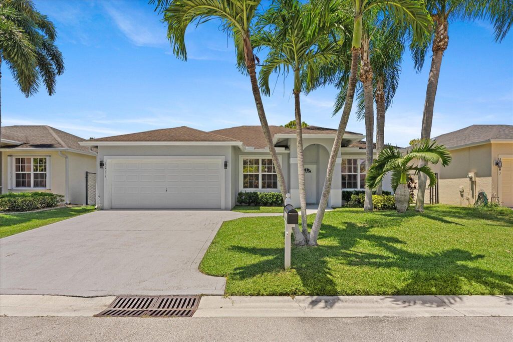 Photo of 1209 Olympic Circle, Greenacres, FL 33413 (MLS # R11100595)