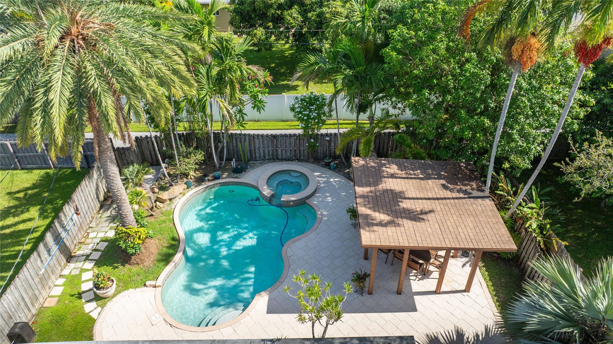 Call Now- This opportunity won't last through the season! Step into your own Tropical Paradise! This updated 2-bedroom, 2-bath home in east Dania Beach brings Florida living to life! Spacious living room opens up to backyard oasis. The chef's kitchen features top-of-the-line Bosch stainless steel appliances, granite countertops & island. Florida room can be a third bedroom. With mostly hurricane impact windows, remodeled bathrooms, tile, the home radiates elegance. Brand new in 2025: pool heater, garage door motor & water heater (2020). Enjoy the ultimate outdoor experience with heated saltwater pool & gazebo. No HOA, can rent right away! Just minutes from Ft Lauderdale International Airport, beaches & dining. This home is a lifestyle! Can be Furnished or Unfurnished!