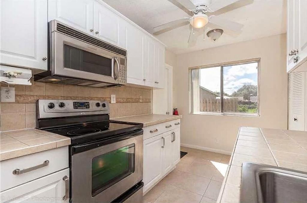 Photo of 2681 NW 108TH Avenue, Sunrise, FL 33322 (MLS # B26056003)