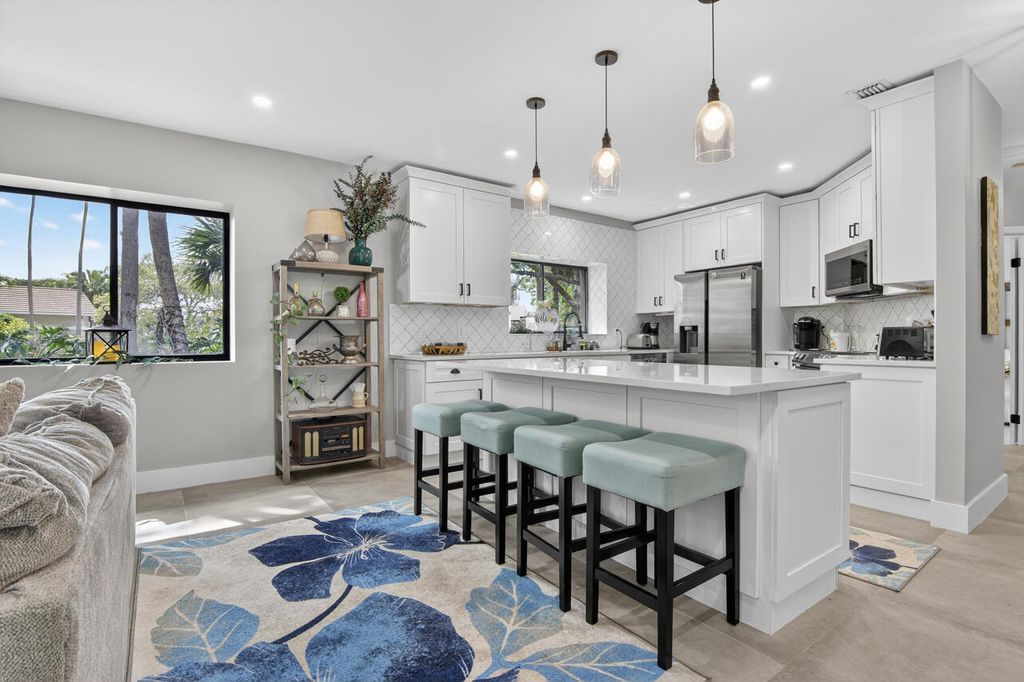 Photo of 1143 Duncan Circle #Unit 104, Palm Beach Gardens, FL 33418 (MLS # B26005404)