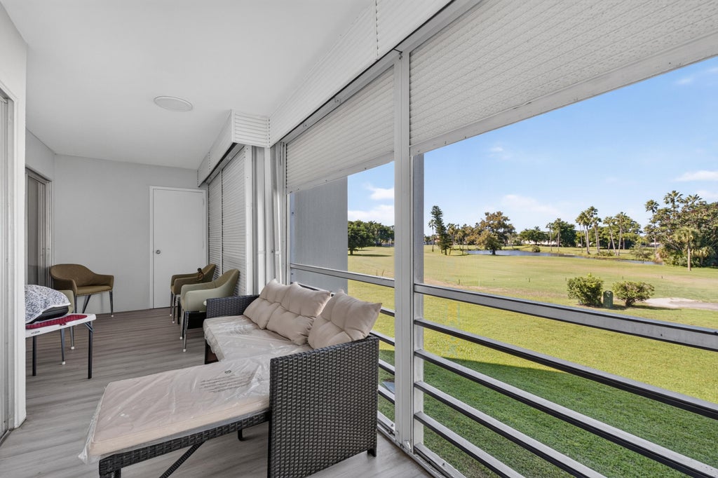 Photo of 3871 VIA POINCIANA #202, Lake Worth, FL 33467 (MLS # B26092723)