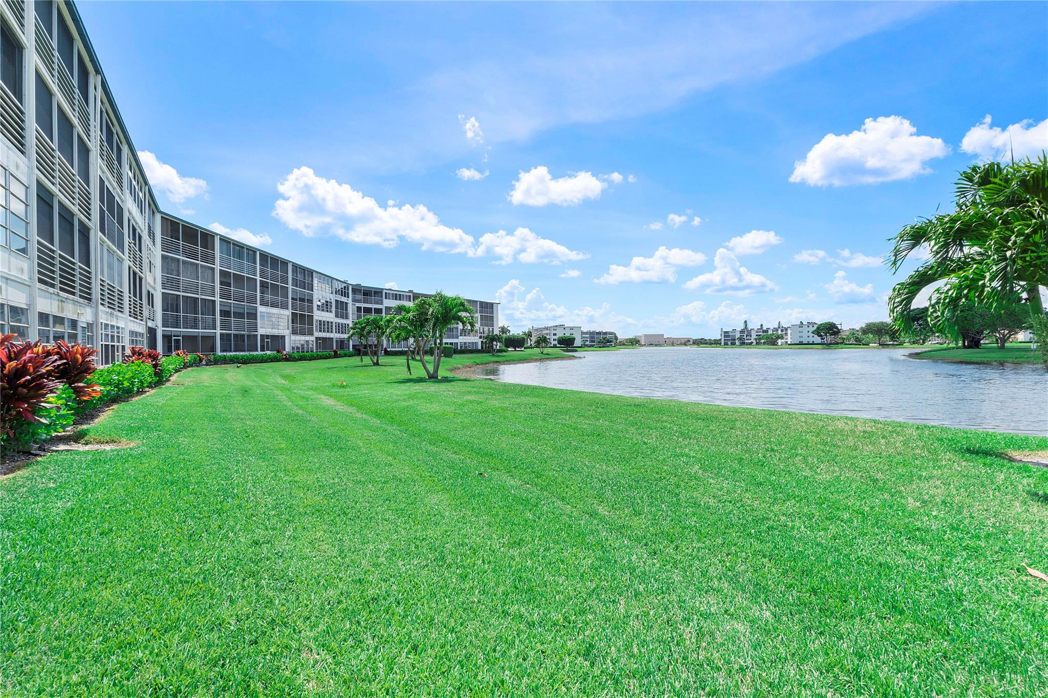 Fully Furnished condo located in the heart of Boca Raton! HOA Approval required. First floor- Open layout concept, engaging Living room and dining room, perfect for entertaining! Kitchen and bathrooms have top of the line Imported Italian granite and cabinetry. Brazilian cherry floors throughout with State-of-the-art spacious bathrooms. Stunning Primary bedroom with Flat screen TV. Guest bedroom with walk-in California closet...Leading out to screened in patio through elegant double French doors with built In blinds. This gorgeous patio has custom furniture that can accommodate a large group! Amazing panoramic water views to relax and enjoy. Conveniently located near shopping, highways, transportation, restaurants, beaches, etc. Assigned parking. Gated community. Make an appointment today!