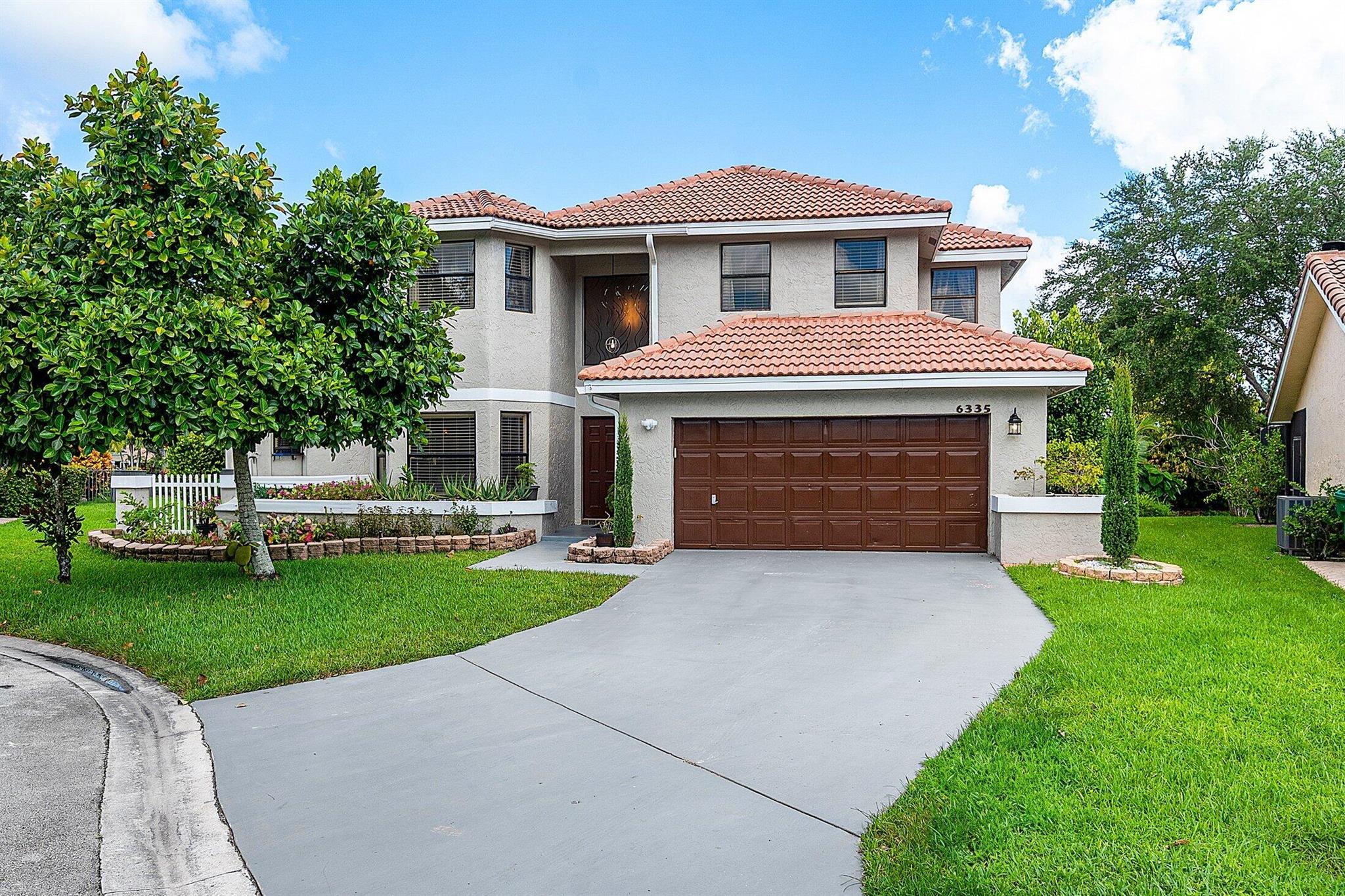 Welcome to sunny Coral Spring. This beautiful home is a delightful oasis that promises the best of South Florida living! This charming two-story home boasts 4 spacious bedrooms and 2.5 baths within its generous 2,687sqft of living space with 3364 total sqft. All set on a lush 9,083 sf lot. Step inside and be greeted by soaring high ceilings that create an expansive and airy ambiance. The open-concept design seamlessly integrates the formal living and dining areas with the cozy family dining and living spaces, making it perfect for both entertaining and everyday living. Culinary enthusiasts will appreciate the well-appointed large open concept kitchen, designed to be the heart of the home. Outside, your private paradise awaits. Enjoy tranquil canal views while soaking in the spa or take a