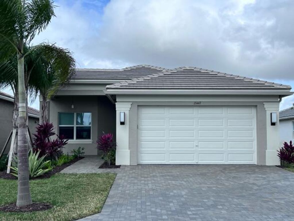 Photo of 13447 SW River Rock Road, Port Saint Lucie, FL 34987 (MLS # R10954428)