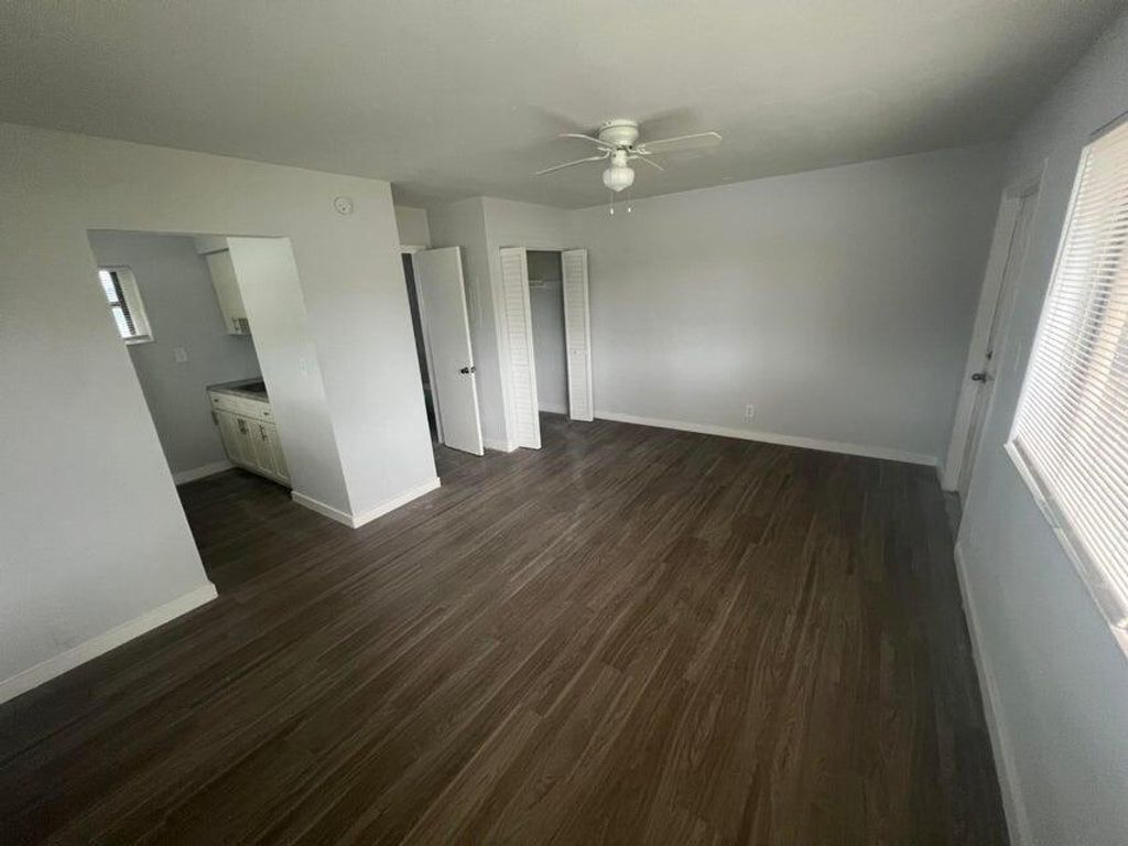 Photo of 1150 W Blue Heron Blvd #1, Riviera Beach, FL 33404 (MLS # R11132852)