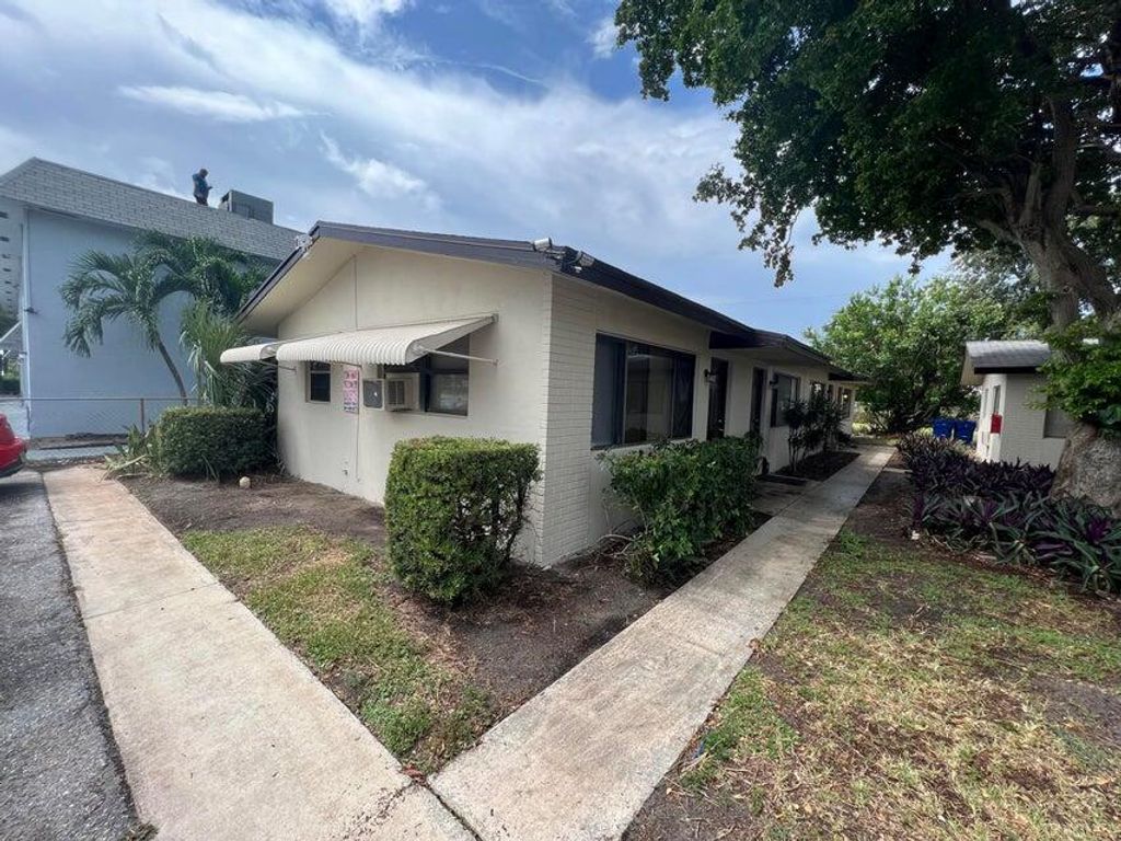 Photo of 1150 W Blue Heron Blvd #1, Riviera Beach, FL 33404 (MLS # R11132852)