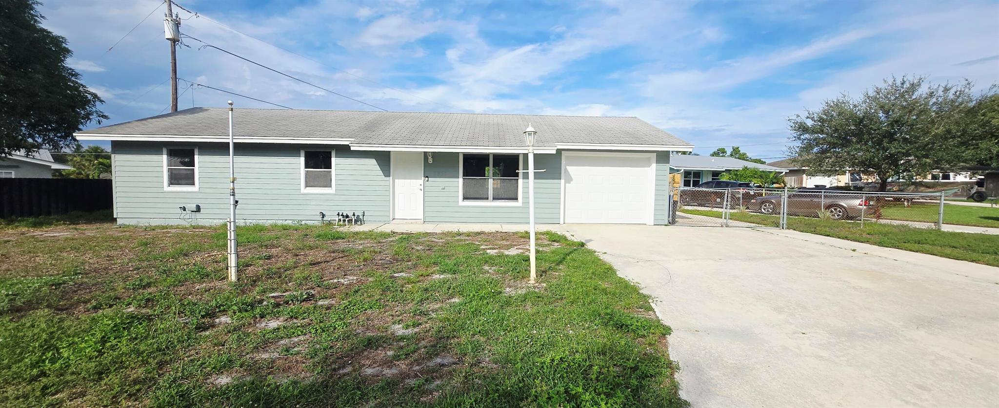 Move right into this totally renovated Pool home today. This home has new soft close cabinets with appliances. New flooring throughout with wood like tile in the wet areas and waterproof luxury laminate in the rooms and main area with extra in the garage. New electrical and baseboards and both bathrooms have been renovated. Pool Gunite newly refinished with new tile and pool pump. New garage door and garage door opener and new water shut offs for all the piping inside the home. Fenced in yard with a side driveway plenty of room for your Boat or RV. Located at the end of the cul de sac for peace and quiet. Freshly painted the whole exterior and interior. Concrete key west siding on the whole home for added protection. If you wish to have pool service included it will be 3300 a month.