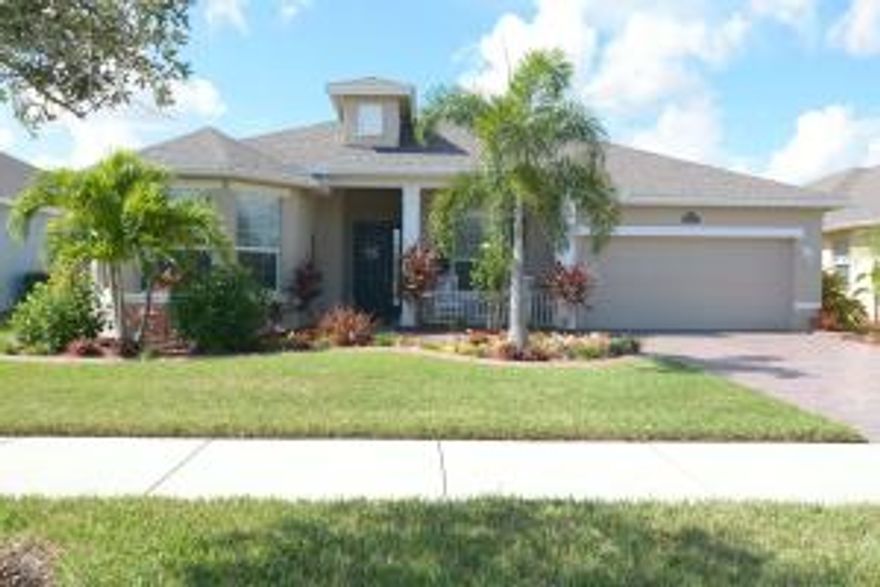 Amazingly Gorgeous Waterfront home located in beautiful Bedford Park with one of the most popular Floor plans! Three bedroom, Two bath, Den designed to have multiple possibilities! Home has many upgrades and has been kept pristine by present sellers! Hurricane impact windows throughout, Transom window in Living area for additional light, tile on diagonal, Wood in all three bedrooms, Gourmet kitchen consiting of 42'' Stunning cabinets, Top of the line Stainless appliances, Granite with glass tile Back splash, Electric cook top with Gas also available if interested in converting. Crown Molding in Living areas and Master Bedroom, LG Washer and Dryer,  Gas line on Patio for Grilling. Additional Recessed lighting Throughout. Under counter lighting in Kitchen and Bar areas. Built in Bar area with additional Cabinets and Granite. Outside living space overlooking the gorgeous lake and bridge view, consists of a 19 x 20 Extended, Covered Lanai, Screened with Brick paver flooring. 3 ft additional pavers beyond screened Lanai area for potted plants. 17 x 17 outside Brick Paver patio for sunning.. Beautiful Custom Drapery in Living room and dining area do convey. Generator available for purchase; does not convey. Home has Tv outlets and additional outlets in every room. Front door has built in Screen door for Beautiful cross breezes. This home is priced to sell and a one of a kind! Hoa covers Lawn Care, Irrigation for Lawn, Pest  Control, Basic cable, Internet, Monitored Alarm, Property manager, Common areas, Clubhouse and pool. Bedford Park is a neighborhood close to the Downtown, allowing you to be able to walk to the stores and events if you so choose! Come and take advantage of true "Florida Living!". This home will not last!