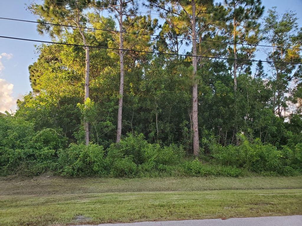 Photo of 6113 NW Deville Circle, Port Saint Lucie, FL 34953 (MLS # R10731915)