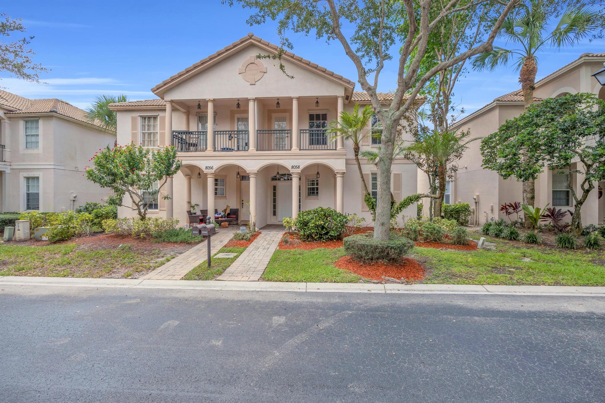 Welcome home to this 3 bedroom, 2 bathroom townhouse with over 1,700 sq. ft. of living space and a 2-car garage, perfectly situated in the heart of Palm Beach Gardens. Light, bright, and freshly updated with new flooring, fresh paint, and plantation shutters throughout, this home is truly move-in ready. A private courtyard backyard provides the perfect retreat or entertaining. Located within a gated community lined with oak trees and walkable sidewalks, residents enjoy a serene setting along with access to a sparkling community pool, park, and beautifully maintained common areas. Just minutes from I-95 and the Florida Turnpike, this home offers unmatched convenience while still feeling tucked away in a welcoming neighborhood. Shopping, dining, golf, and top-rated schools.