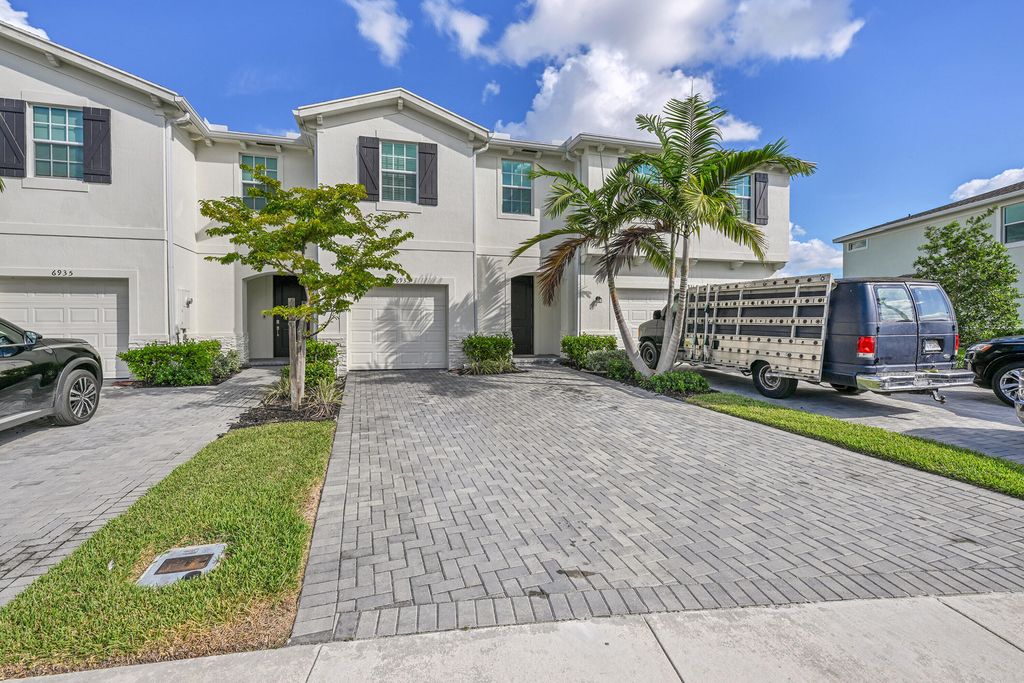 Photo of 6933 Harbours Edge Avenue, Lake Worth, FL 33467 (MLS # R11136510)