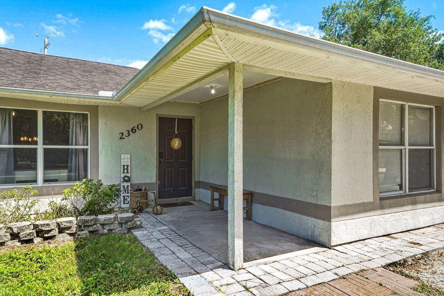 Welcome to this cozy 3-bedroom, 2-bath home situated on a spacious .34-acre lot! This property features a updated kitchen and updated bathrooms, offering both style and functionality. Enjoy the extra space outdoors with plenty of room for entertaining, pets, or future additions. Conveniently located just off State Road 60 with quick access to I-95, making commuting a breeze. You'll love being close to shopping, dining, and everyday essentials including Target, Walmart, Publix, and the nearby outlet mall. Nestled in a family-friendly neighborhood, this home offers the perfect blend of comfort, space, and location. Don't miss this opportunity!