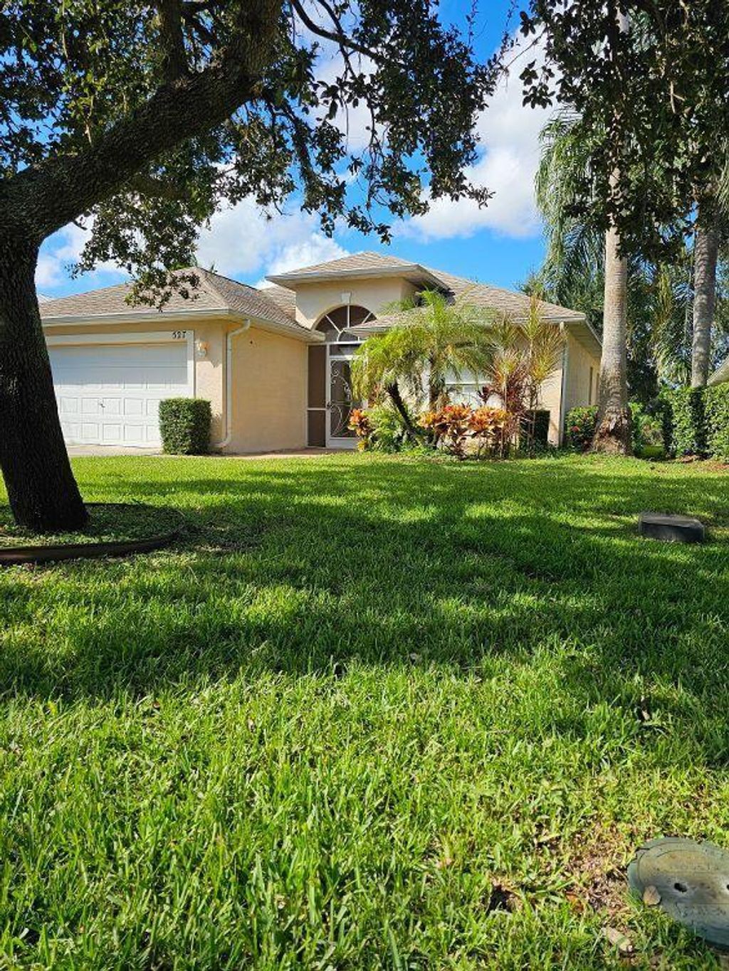 Photo of 527 SW Cyrilla Trail, Port Saint Lucie, FL 34953 (MLS # R10988911)