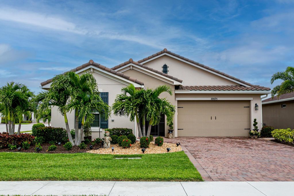 Photo of 10075 SW Coral Tree Circle, Port St Lucie, FL 34987 (MLS # R10895028)