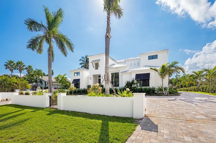 Spectacular New Construction.   This custom designed luxury estate boasts five bedrooms, five and a half baths, a separate guest house, oversized three-car garage, and pool and spa all steps from both the beach and the intracoastal.  Florida custom home builders Bertino & Associates designed and developed a new masterpiece with no expense spared.  Whether you are entertaining guests or relaxing with the family, this luxury home accommodates any gathering. Filled with light, walls of sliders seamlessly allow a true Florida indoor/outdoor living experience.  As you enter through the massive front doorway you are immediately drawn to the great room with its 10ft fireplace, voluminous ceilings and white oak floors that flow throughout the residence.   continued.....
