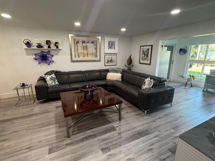 Offered totally furnished, this top-of-the-line designer decorated 2-bedroom plus den, 2-bath ground floor unit includes private  carport parking. Open plan. Completely renovated in 2022: new kitchen, new appliances, water filtration, wine chiller, tankless water heater, Roman shades, new a/c, new hot water heater, new roof and gutters in 2025. World-classs amenities include tennis, pickel ball, pools, clubhouse, theatre, fitness -- everything EXCEPT golf! Active 55+ adult community. Club offers breakfast and lunch daily and dinner can be delivered right to your door with a tip.