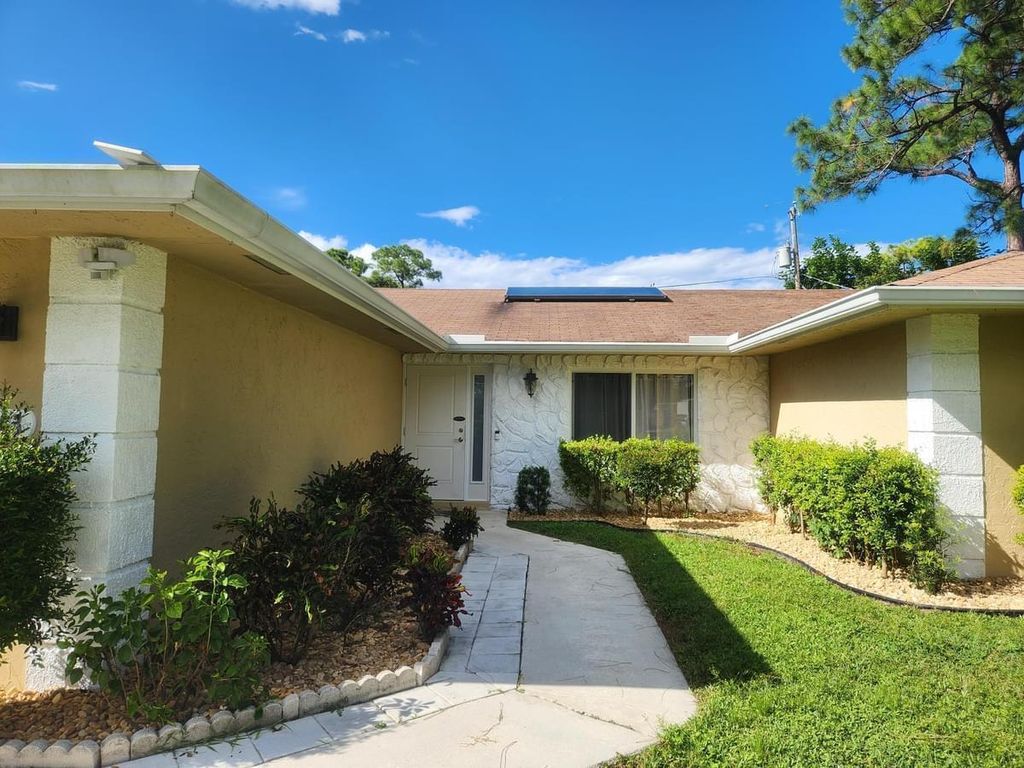 Photo of 4693 Dolphin Drive, Lake Worth, FL 33463 (MLS # B26002249)
