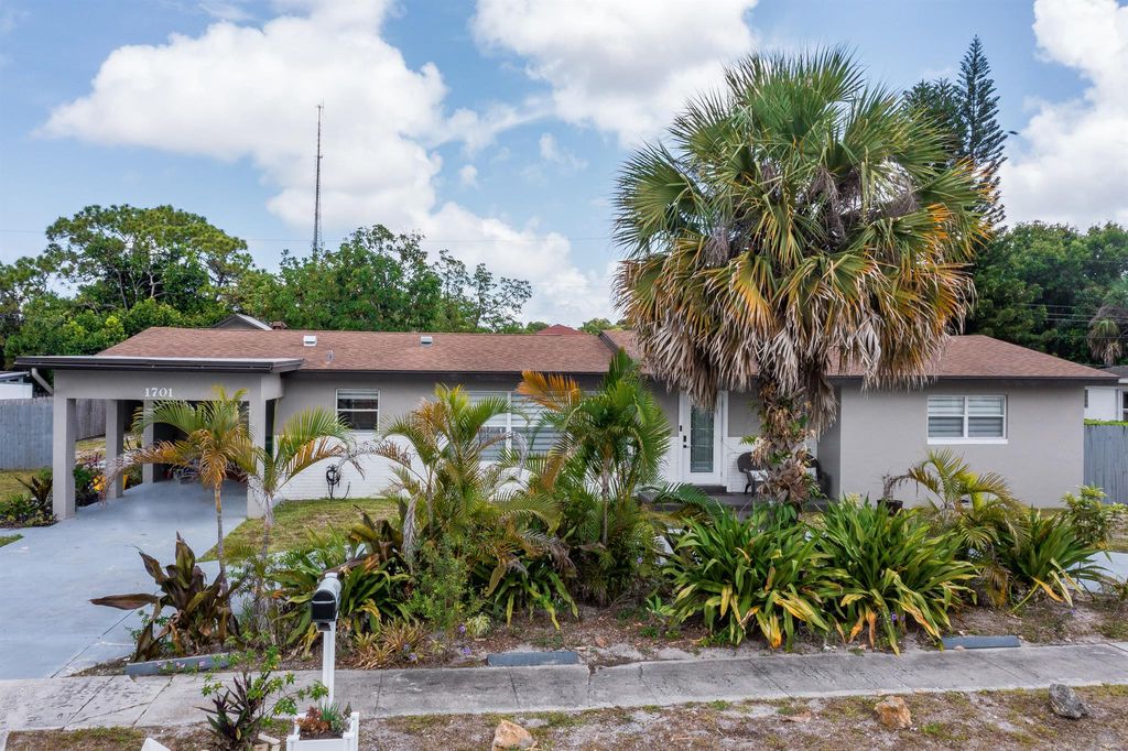 Photo of 1701 Boardman Avenue S, Mangonia Park, FL 33407 (MLS # R10892158)