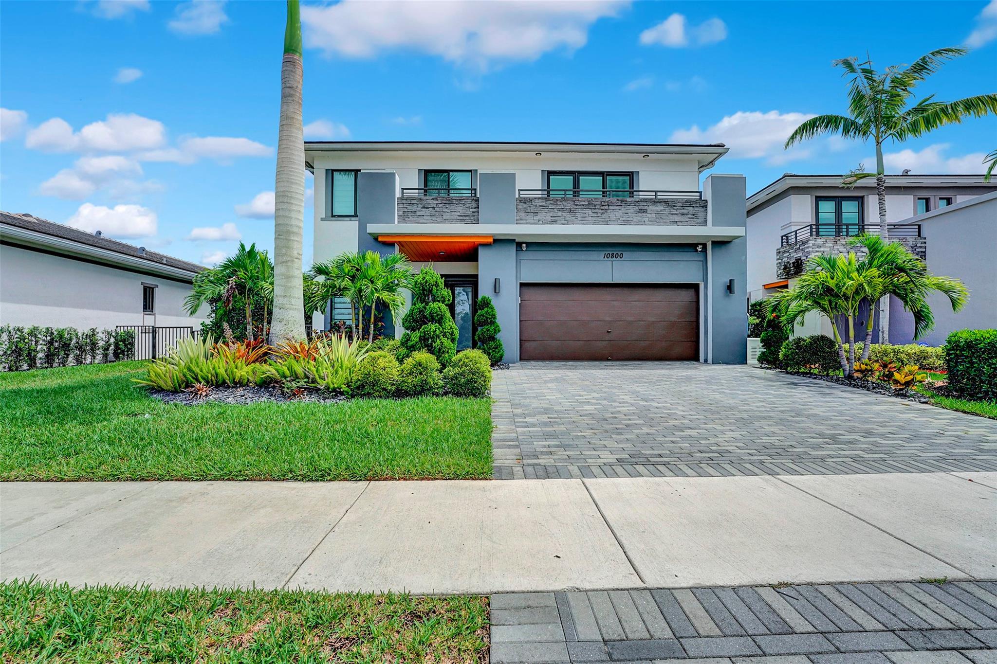Experience elevated lakefront living in this fully renovated, designer-upgraded 5-bedroom, 4-bathroom home in the prestigious gated community of Cascata at MiraLago. This turnkey residence offers the perfect combination of modern elegance, smart functionality, and resort-style amenities. Step into a light-filled, open-concept layout featuring soaring ceilings, designer flooring, high-end finishes, and custom wallpaper throughout. Custom kitchen perfect for entertaining! Step outside into your private, resort-style backyard retreat—complete with a custom pool, full outdoor kitchen, maintenance-free turf lawn, and a premium built-in Sonos sound system for the ultimate entertaining experience. Too many upgrades to list including a full house Generac generator and outdoor security cameras.