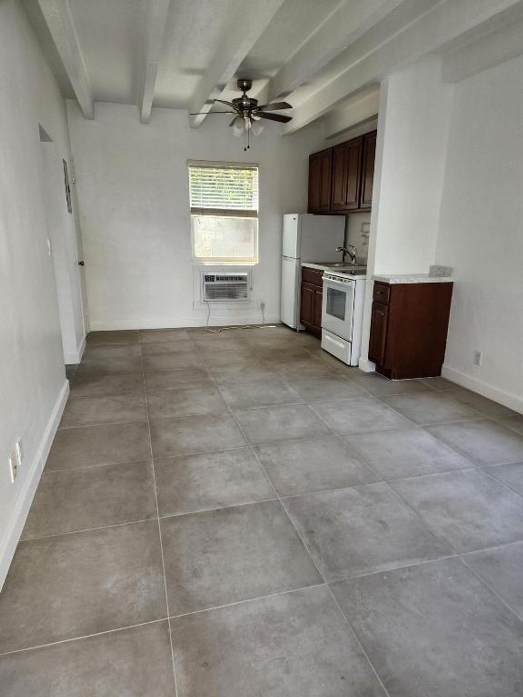 Photo of 100 Cascade Lane #5, Palm Beach Shores, FL 33404 (MLS # R11147916)