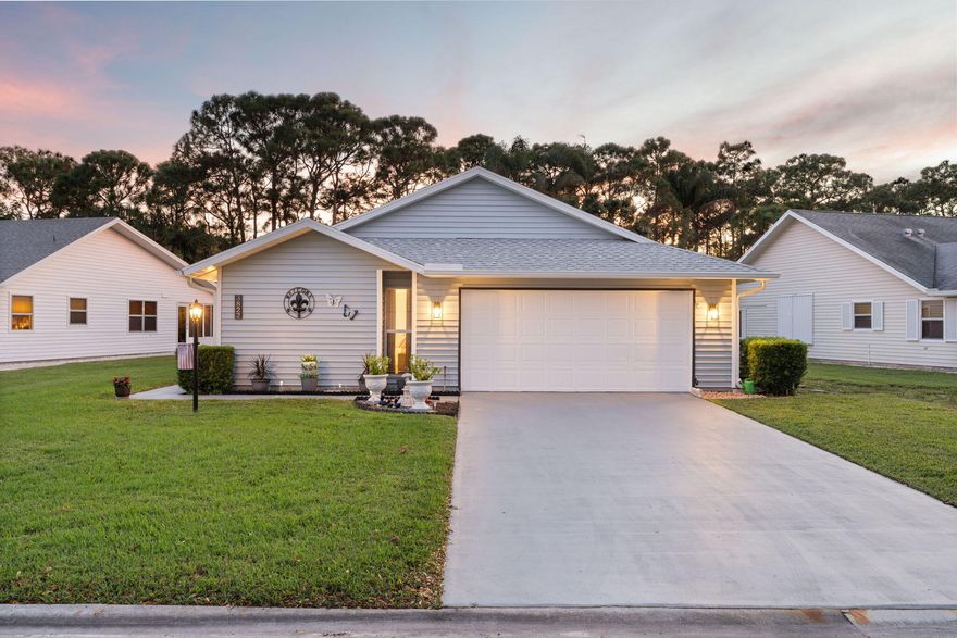 Set within the tranquil 55+ community of Duckwood, centrally positioned between Stuart and Jupiter, this fully renovated three-bedroom, two-bath residence offers an easy balance of comfort and contemporary living. Interiors have been comprehensively refreshed with brand-new interior and exterior paint and new luxury flooring, creating a clean, cohesive aesthetic throughout.

The kitchen is both refined and functional, featuring granite countertops, updated stainless-steel appliances, and generous cabinetry designed for everyday use. An open-plan layout allows natural light to flow through the main living spaces, supporting effortless entertaining and day-to-day living. Both bathrooms have been reimagined with modern finishes, while the primary suite is enhanced by custom closet organizers that bring clarity and order to the space. Recent improvements include a new water heater and a recently installed roof, reinforcing the home's turnkey appeal.

Beyond the enclosed porch, freshly landscaped grounds transition to a lush preserve, offering privacy and a natural backdrop for quiet mornings and evening gatherings. Central to Stuart and Jupiter, the residence pairs peaceful surroundings with convenient accessan understated expression of refined Florida living.