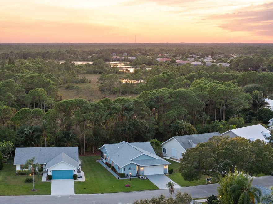Set within the tranquil 55+ community of Duckwood, centrally positioned between Stuart and Jupiter, this fully renovated three-bedroom, two-bath residence offers an easy balance of comfort and contemporary living. Interiors have been comprehensively refreshed with brand-new interior and exterior paint and new luxury flooring, creating a clean, cohesive aesthetic throughout.

The kitchen is both refined and functional, featuring granite countertops, updated stainless-steel appliances, and generous cabinetry designed for everyday use. An open-plan layout allows natural light to flow through the main living spaces, supporting effortless entertaining and day-to-day living. Both bathrooms have been reimagined with modern finishes, while the primary suite is enhanced by custom closet organizers that bring clarity and order to the space. Recent improvements include a new water heater and a recently installed roof, reinforcing the home's turnkey appeal.

Beyond the enclosed porch, freshly landscaped grounds transition to a lush preserve, offering privacy and a natural backdrop for quiet mornings and evening gatherings. Central to Stuart and Jupiter, the residence pairs peaceful surroundings with convenient accessan understated expression of refined Florida living.