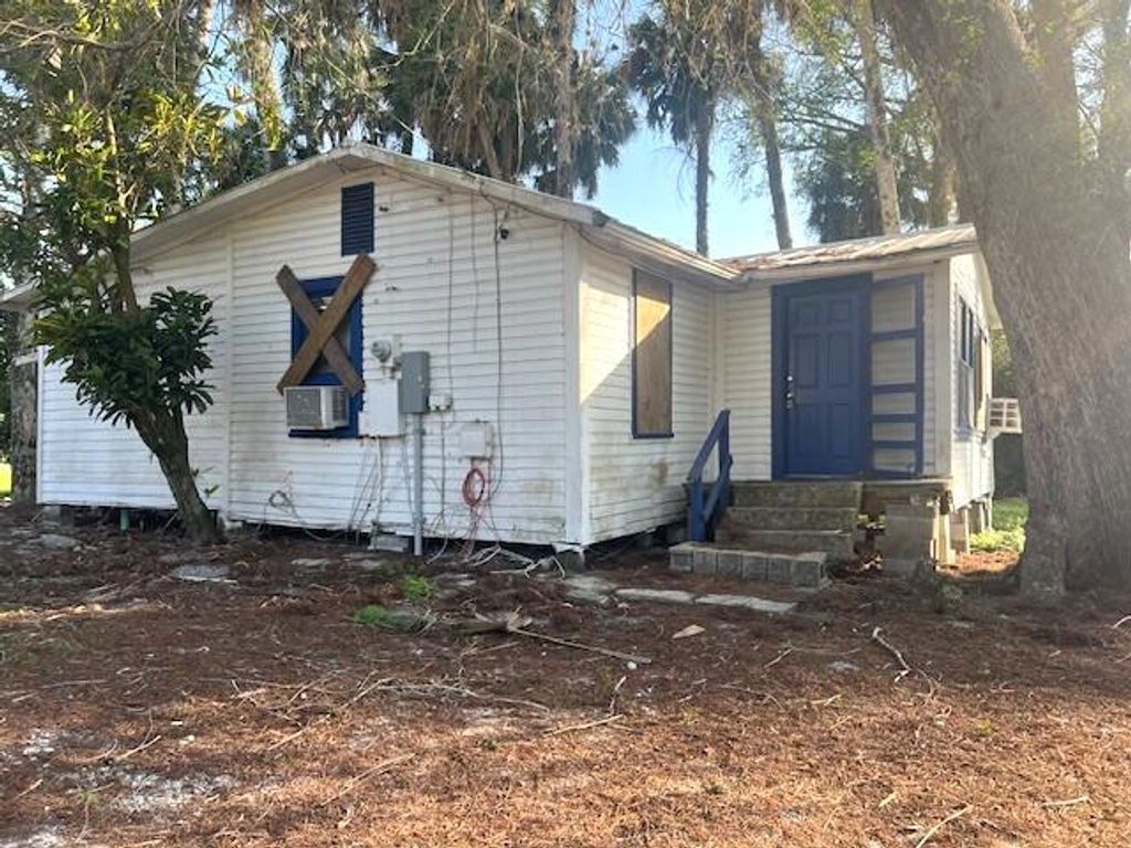 Photo of 2024 E Main Street, Pahokee, FL 33476 (MLS # R11072491)