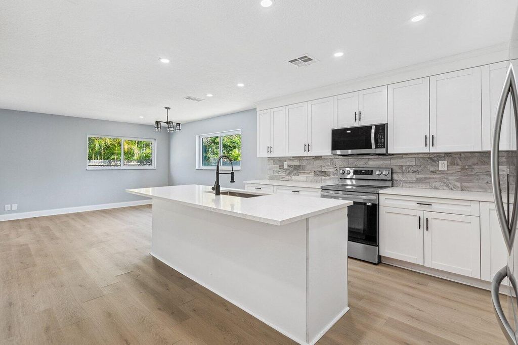 Photo of 739 Mallard Drive, Delray Beach, FL 33444 (MLS # R11043339)