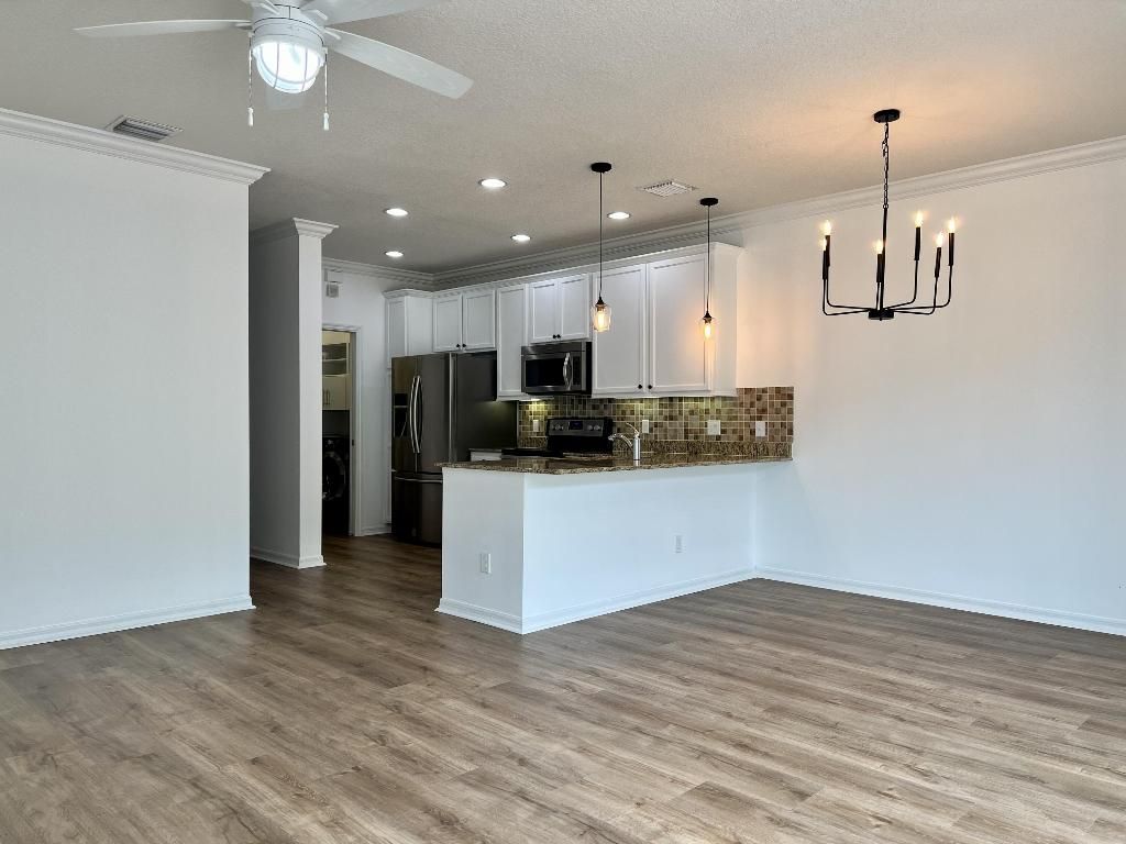 Photo of 1358 Turnbridge Drive, Jupiter, FL 33458 (MLS # R10967196)